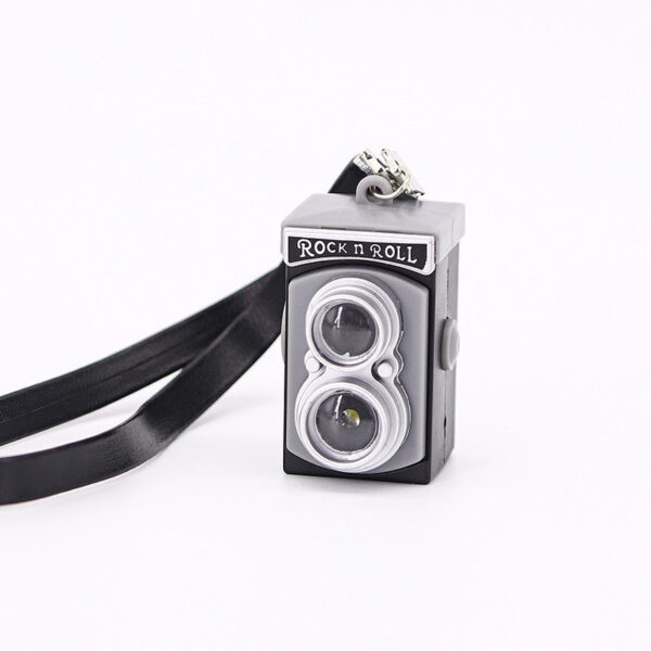 Mini strap camera with wearable portable body design